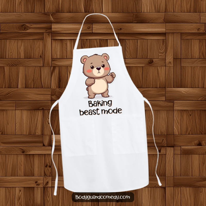 Funny apron showcasing a protective bear playfully flexing its small muscles, ready to defend with humor and strength.