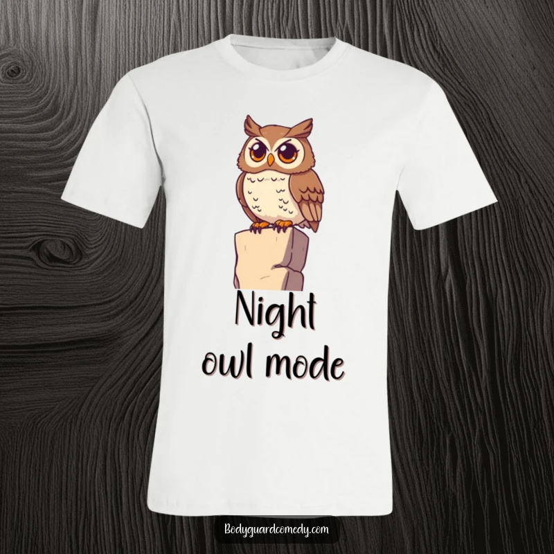 Funny watchful owl perched on a high ledge, scanning the horizon with wide eyes on a t-shirt, displaying sharp awareness.
